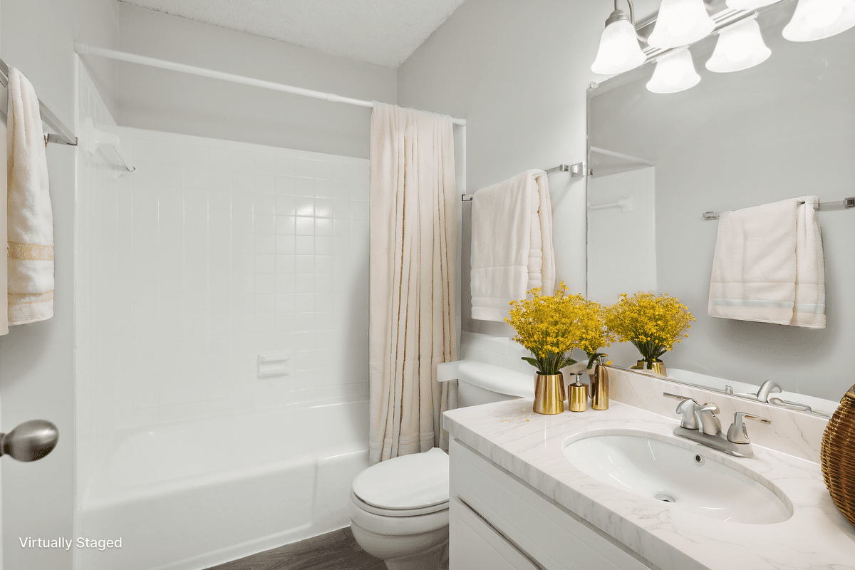 Virtually staged bathroom in a Quail Run apartment home