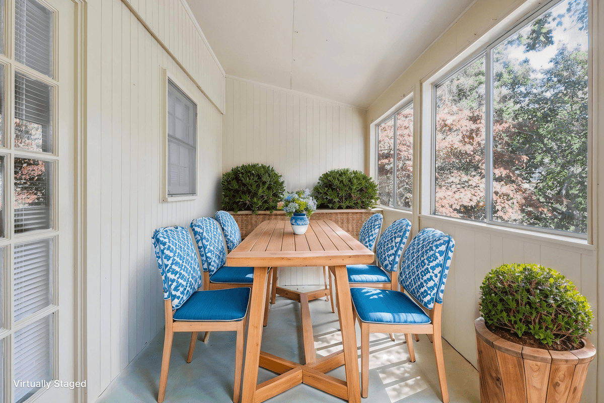 Virtually staged screened porch at a Quail Run apartment home